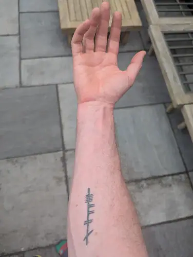 Ogham tattoo —  on wrist
