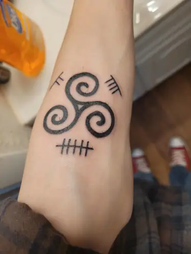 Ogham tattoo —  on wrist