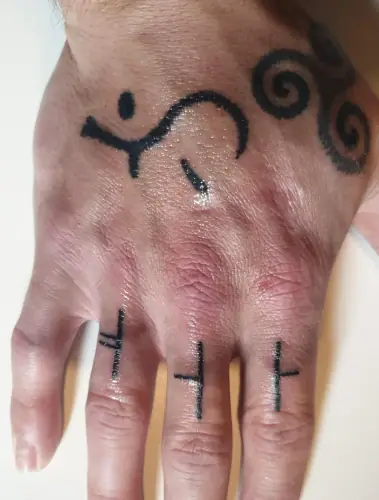 Ogham tattoo —  on finger