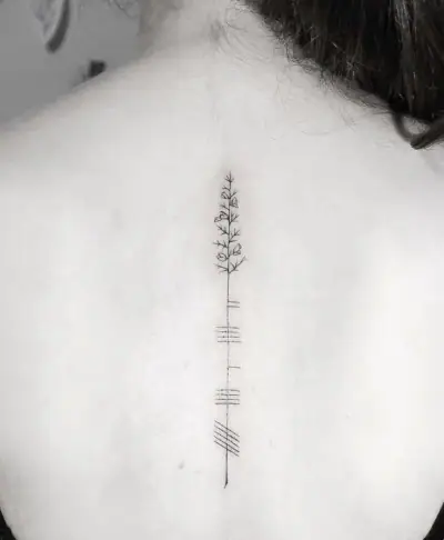 Ogham tattoo —  on spine