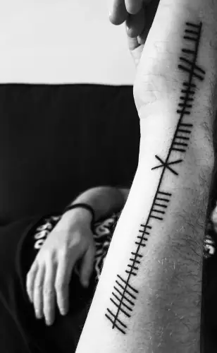 Ogham tattoo —  on wrist