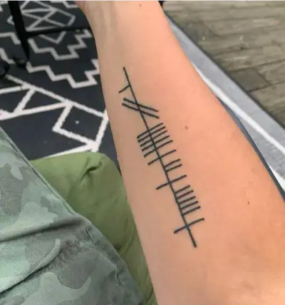 Ogham tattoo —  on wrist