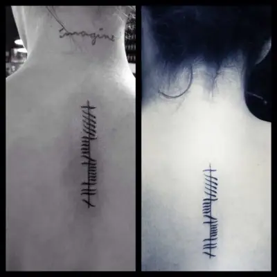 Ogham tattoo —  on spine